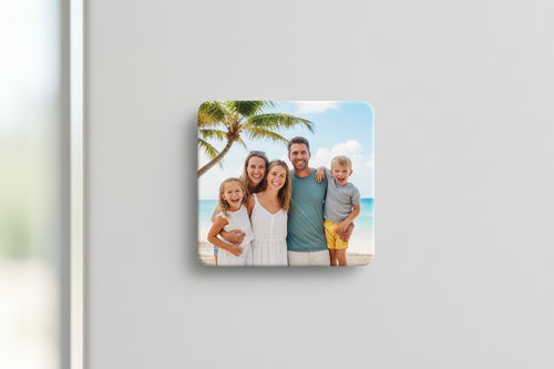 Custom 2x2 glossy photo magnet on a refrigerator